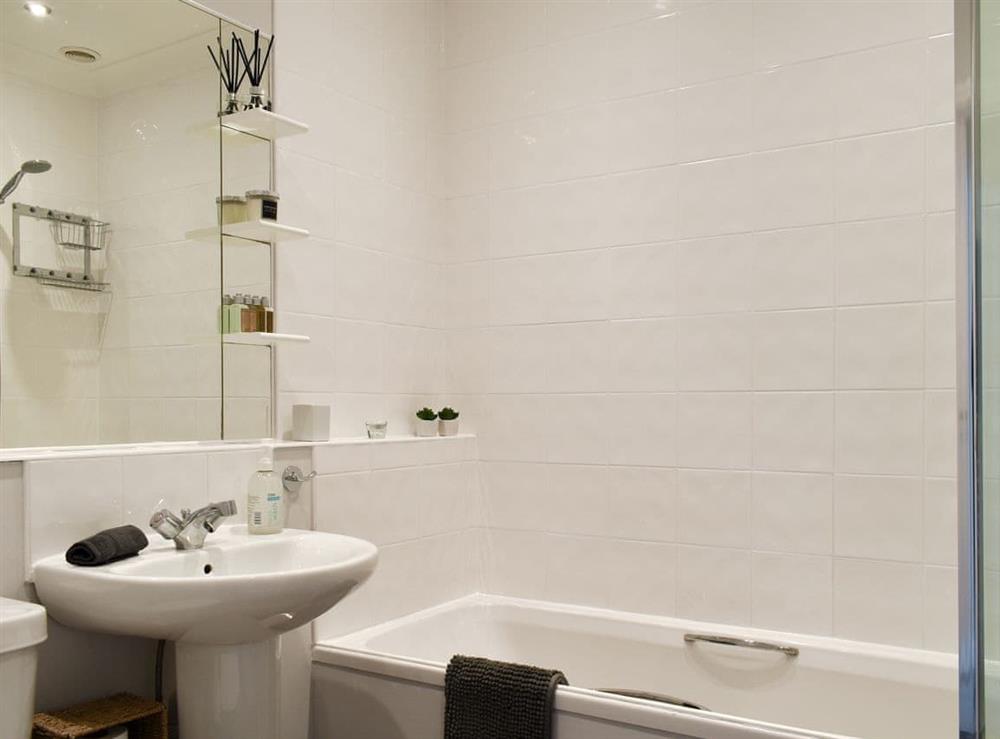 Family bathroom with shower over bath at Pier View in Gorleston-on-Sea, Norfolk
