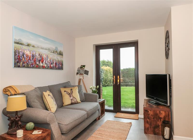 Relax in the living area at Piglet Corner, Culmstock