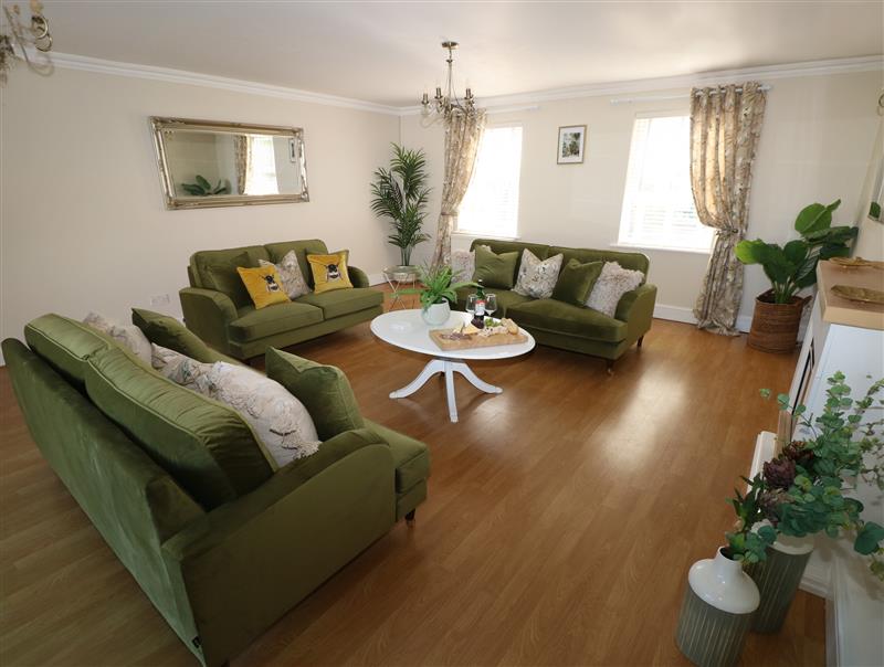 Relax in the living area at Piglet Cottage, St Ishmaels near Milford Haven