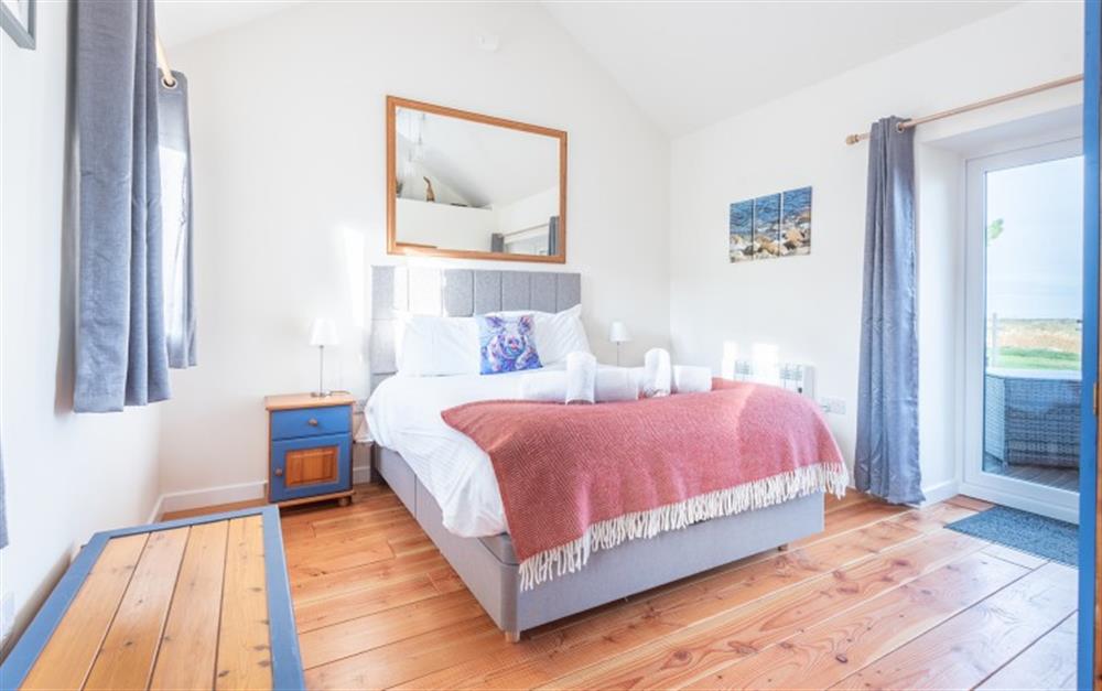 The bedroom is beautifully furnished and gets plenty of light. at PigLet in Gwennap