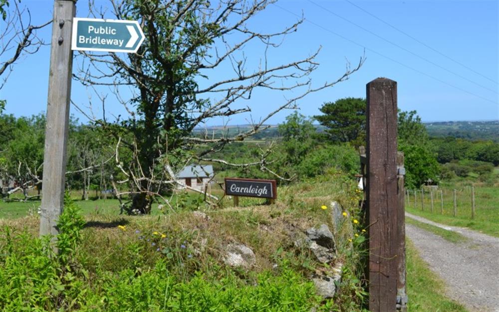 The entrance to Carnleigh, home to PigLet. There's a kissing gate directly behind us. That's the way up to Carn Marth itself, one of the highest points in Cornwall. at PigLet in Gwennap