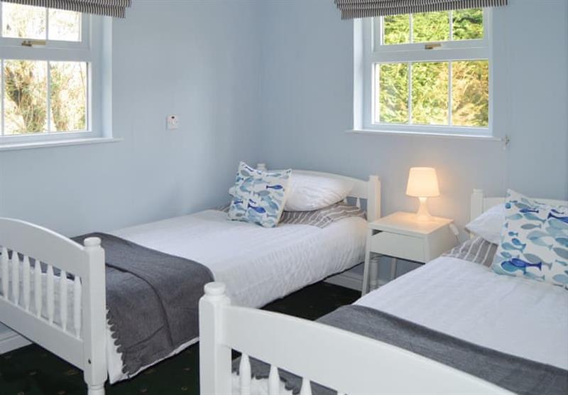 Twin bedroom in the Old Stone Cottage at Pilbach Holiday Park in Ceredigion, Mid Wales