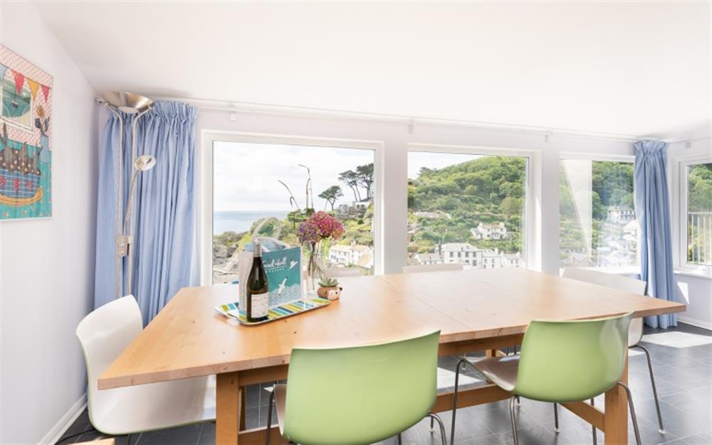 The dining table in the kitchen at Pilchard Rock in Polperro