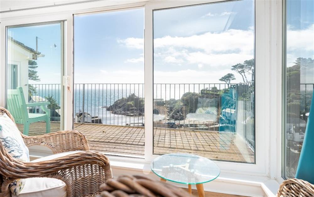 The lounge view with access to balcony at Pilchard Rock in Polperro