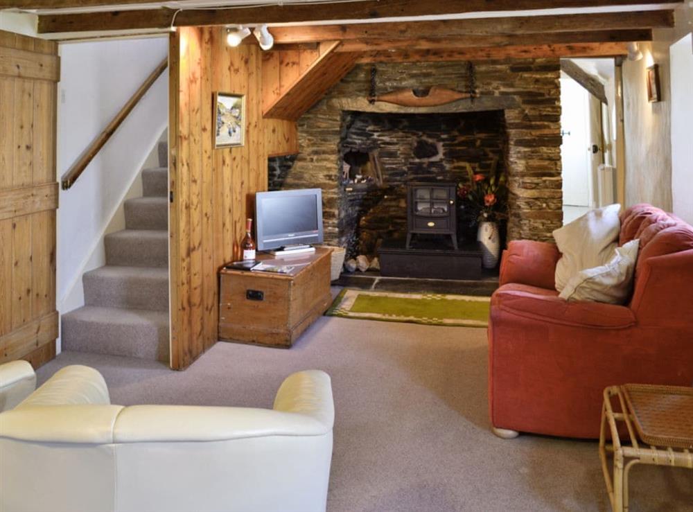 Living room/dining room at Pillar Box Cottage in Tintagel, Cornwall