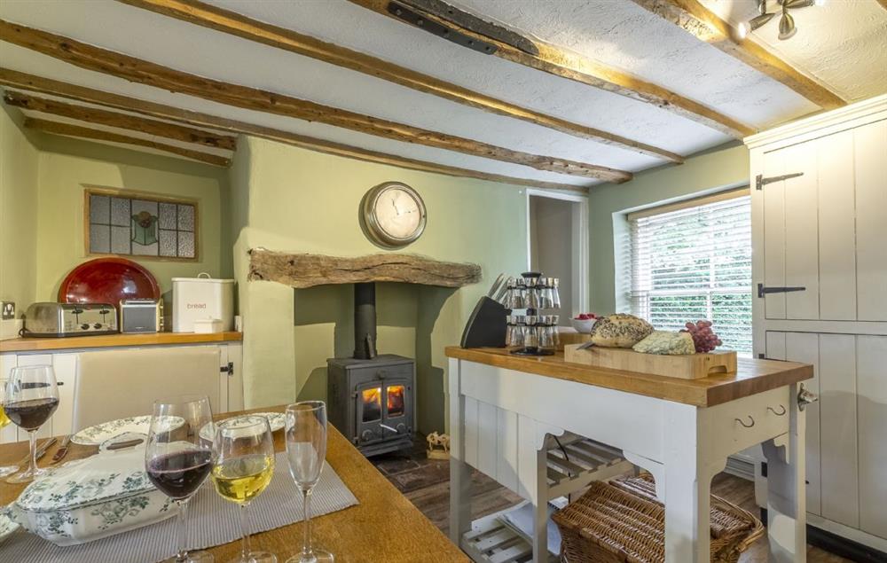 Large kitchen/dining room with wood burning stove at Pillar Box House, Hackford