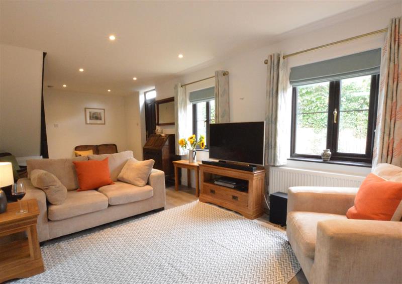 Relax in the living area at Pine Cottage, Melton, Woodbridge