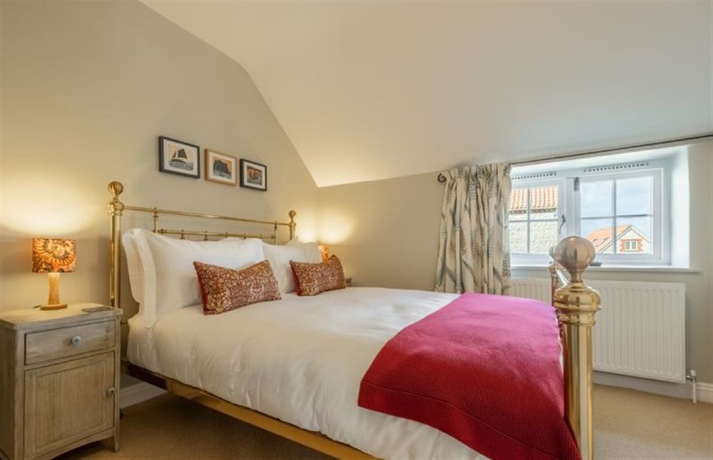 First floor: Bedroom two at Pine Cottage, Thornham near Hunstanton