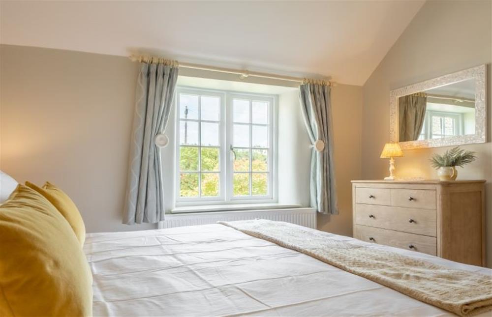 First floor: Master bedroom (photo 2) at Pine Cottage, Thornham near Hunstanton