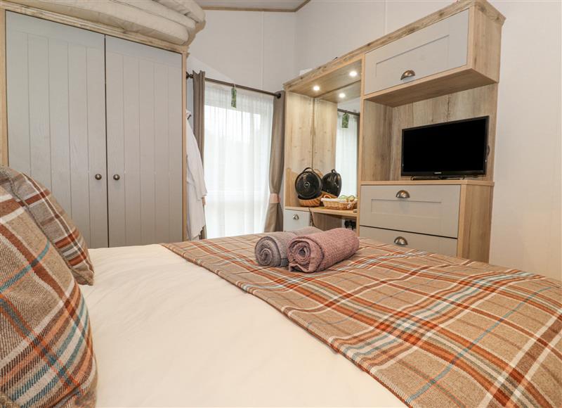 A bedroom in Pine Lake View at Pine Lake View, Warton near Tewitfield