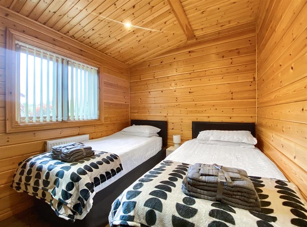Twin bedroom at Pine Lodge in Camerton, near Bath, Avon