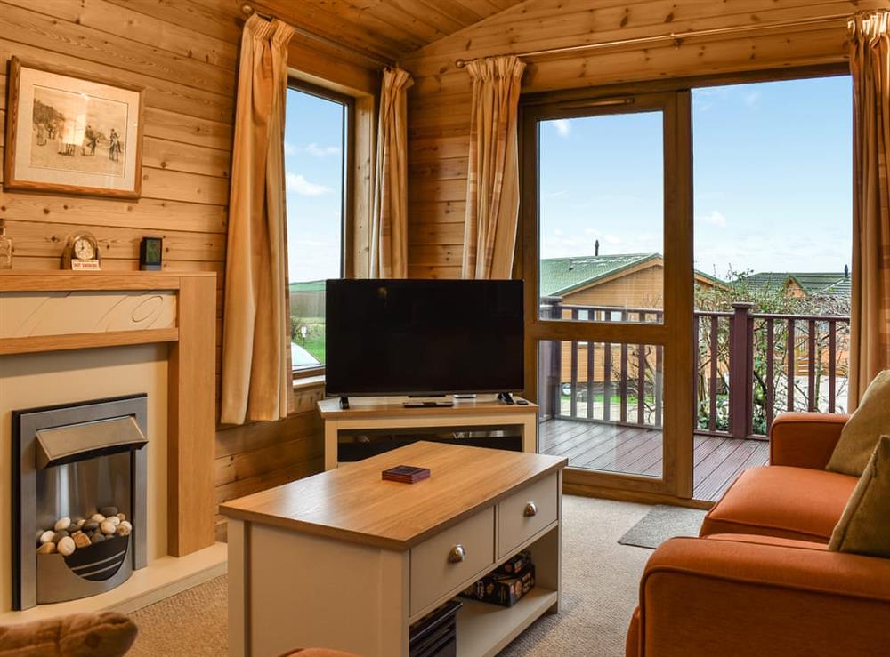 Living area at Pine Lodge in Ilfracombe, Devon