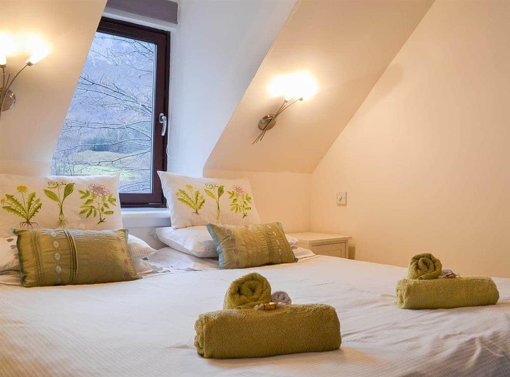 Double bedroom at Pine Martin Cottage in Ballachulish, near Glencoe, Argyll