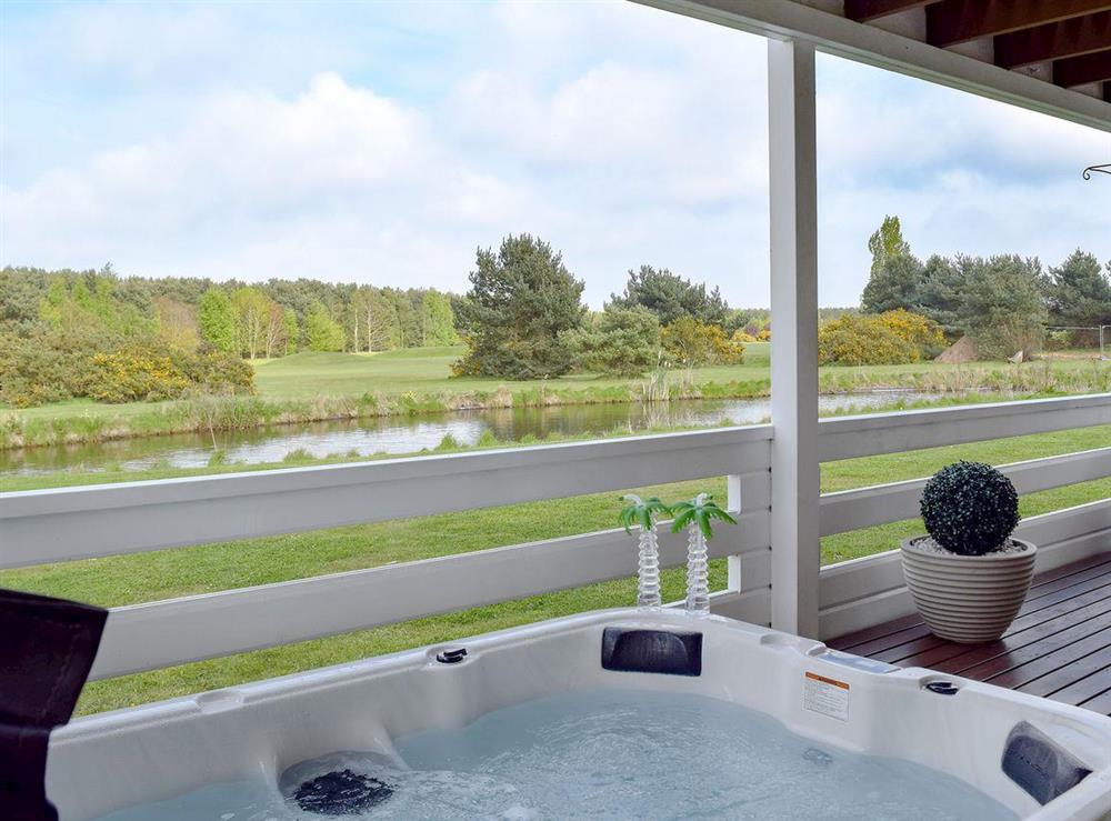Relaxing hot tub at Pine View in Fritton, near Great Yarmouth, Norfolk