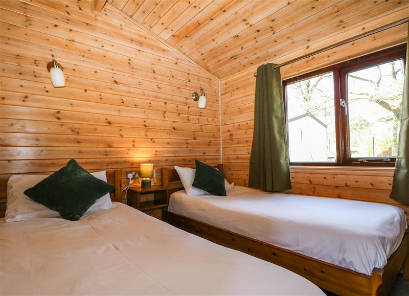 This is a bedroom at Pinecone Cabin, Godshill