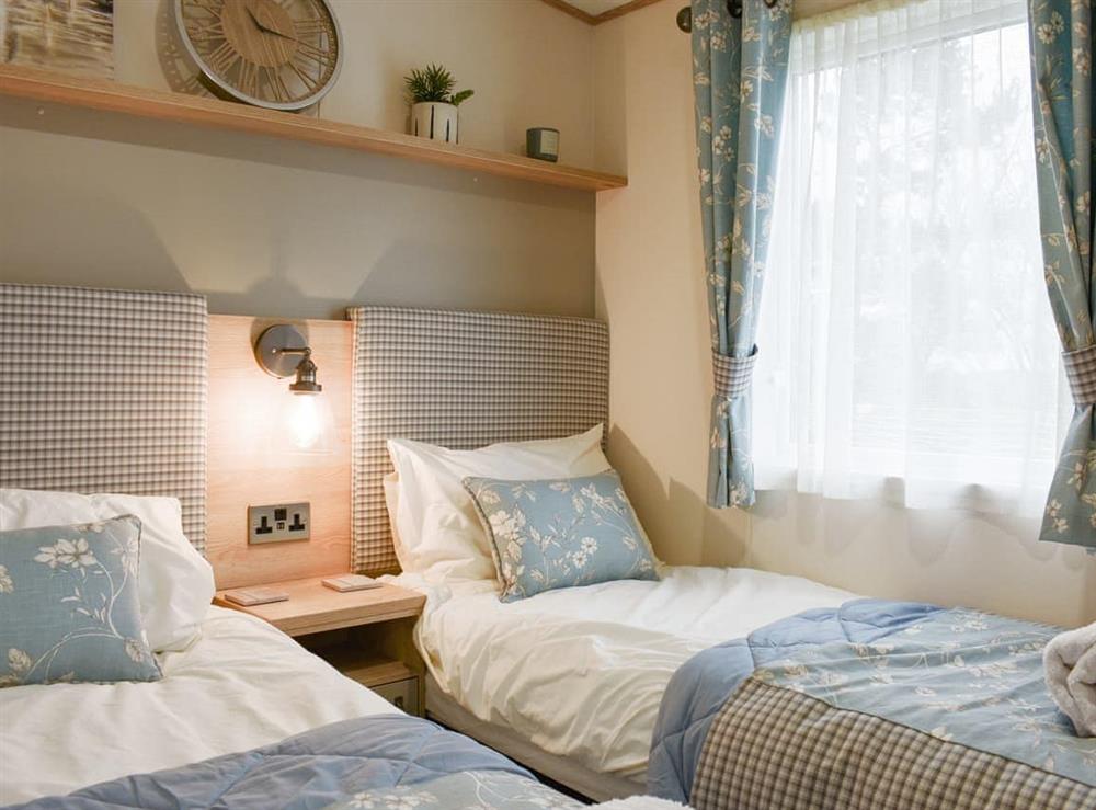 Twin bedroom at Pinecone Lodge in East Heslerton, near Malton, North Yorkshire