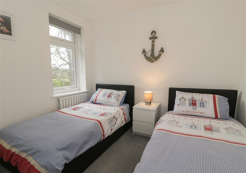 This is a bedroom at Pinecones, Morfa Bychan