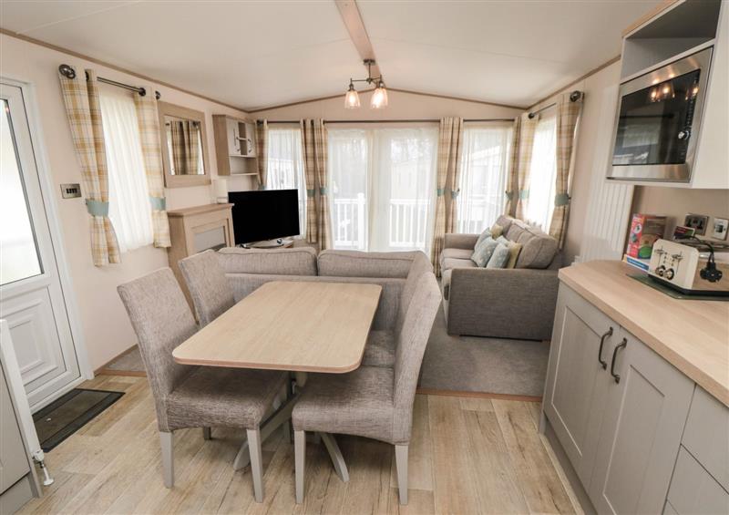 Relax in the living area (photo 2) at Pines 32, Cayton