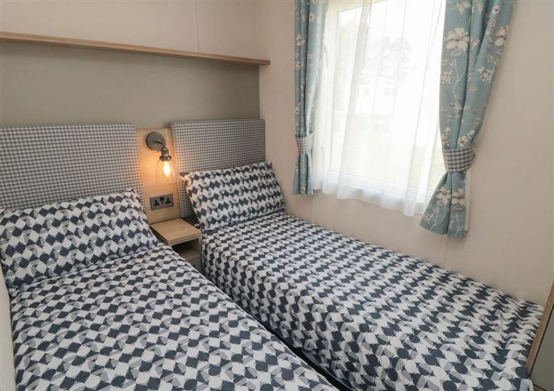 This is a bedroom at Pines 32, Cayton