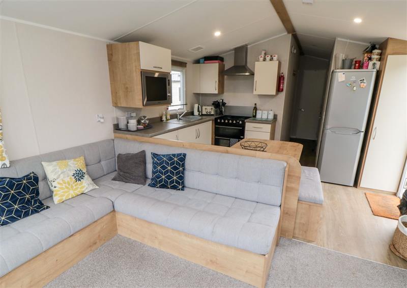 Relax in the living area at Pines, Cayton