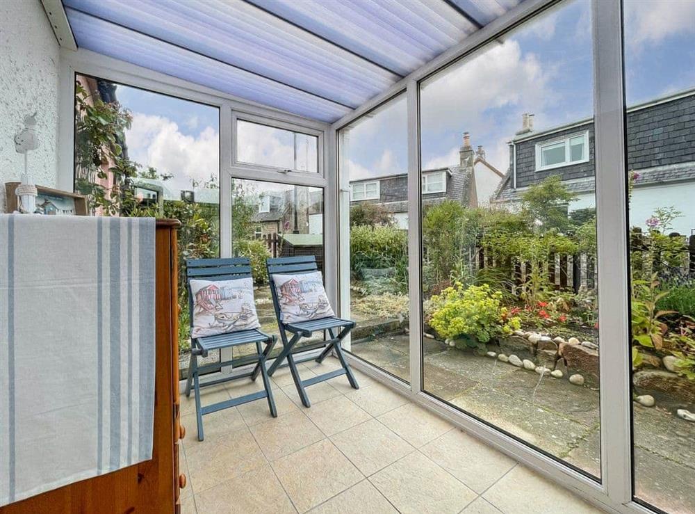 Sun room at Pink Cottage in Nairn, Morayshire