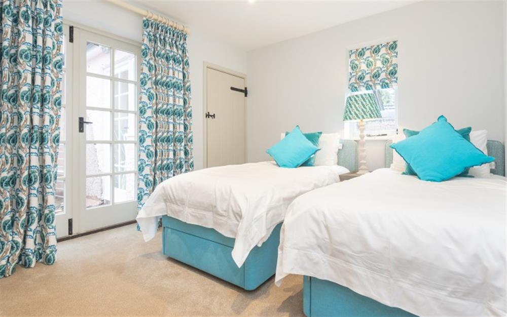 Twin bedroom  at Pink Cottage in Noss Mayo