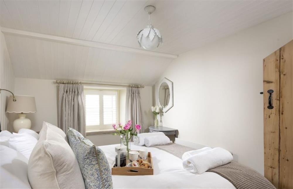 Master bedroom, enjoy a comfortable night sleep in a 5’ king size bed at Pink Cottage, Penzance