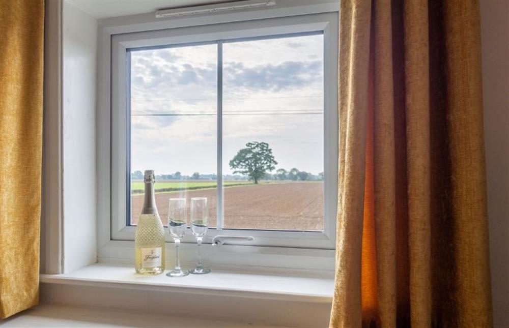 Views of the surrounding countryside from the master bedroom at Pink Cottage, Stradbroke