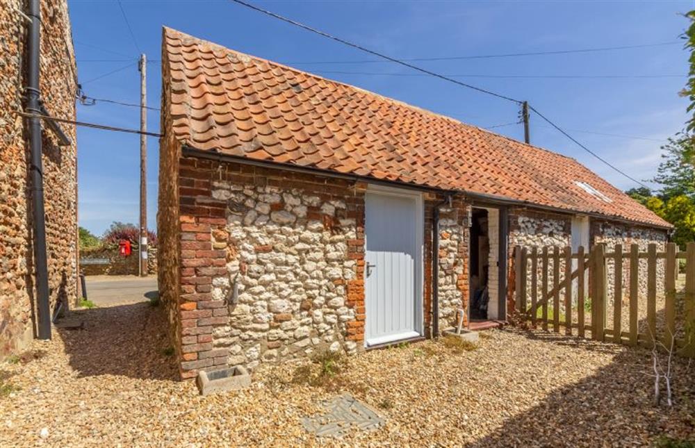 Utility room is within the outbuilding at Piper Cottage, Holme-next-the-Sea near Hunstanton