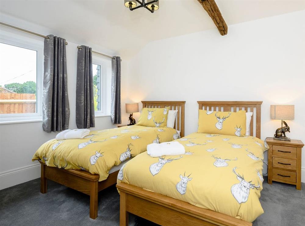 Charming twin bedroom at Pipistrelle Barn in North Walsham, Norfolk