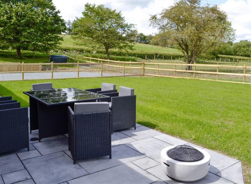 Furnished patio area with rural views at Pipistrelle in Garth, near Builth Wells, Powys