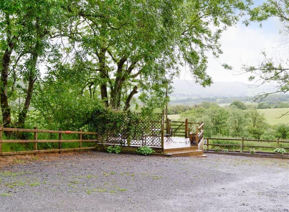 Parking area and decked patio at Pipistrelle in Garth, near Builth Wells, Powys