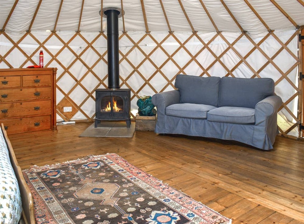 Living area at Pippin Yurt in Beaminster, Dorset
