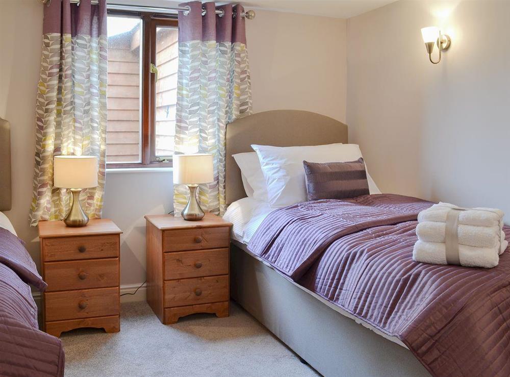 Comfortable twin bedroom at Pippins in Penybont, Powys