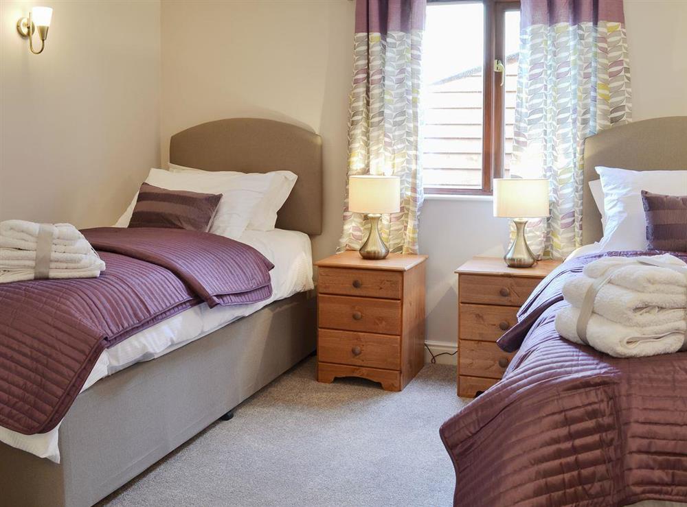 Ideal twin bedroom at Pippins in Penybont, Powys