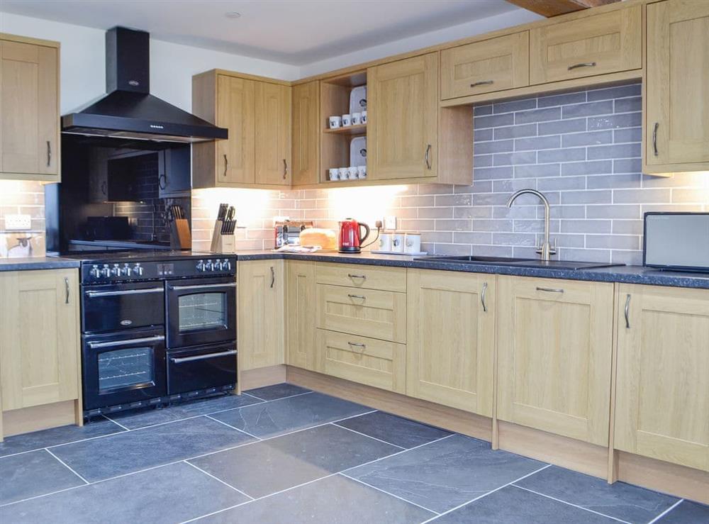 Lovely fitted kitchen at Pistyll Gwyn in Llanwrthwl, near Rhayader, Powys