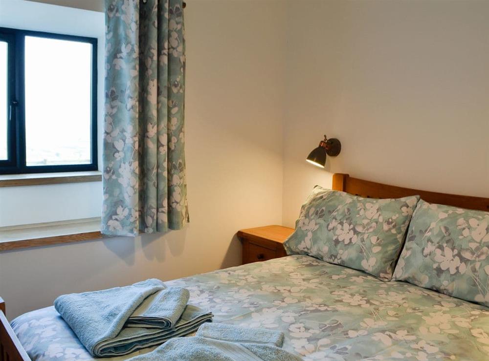 Welcoming double bedroom at Pistyll Gwyn in Llanwrthwl, near Rhayader, Powys