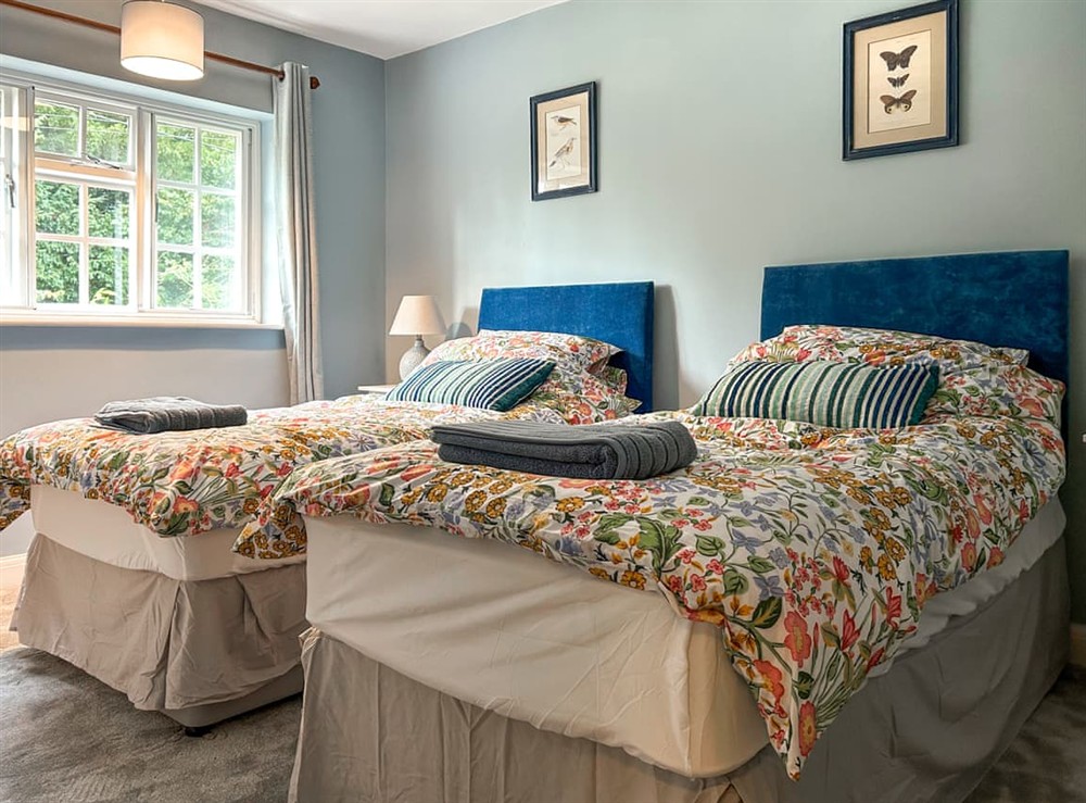 Twin bedroom at Pitsford Cottage in Pitsford, Northamptonshire