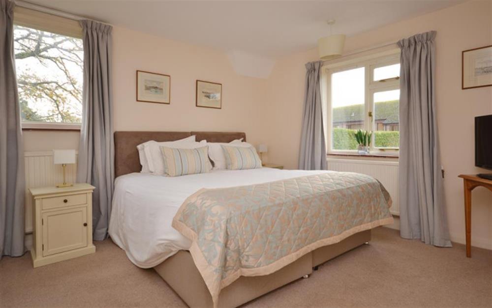 First floor double bedroom with lots of natural light at Pittefaux Cottage in Brockenhurst