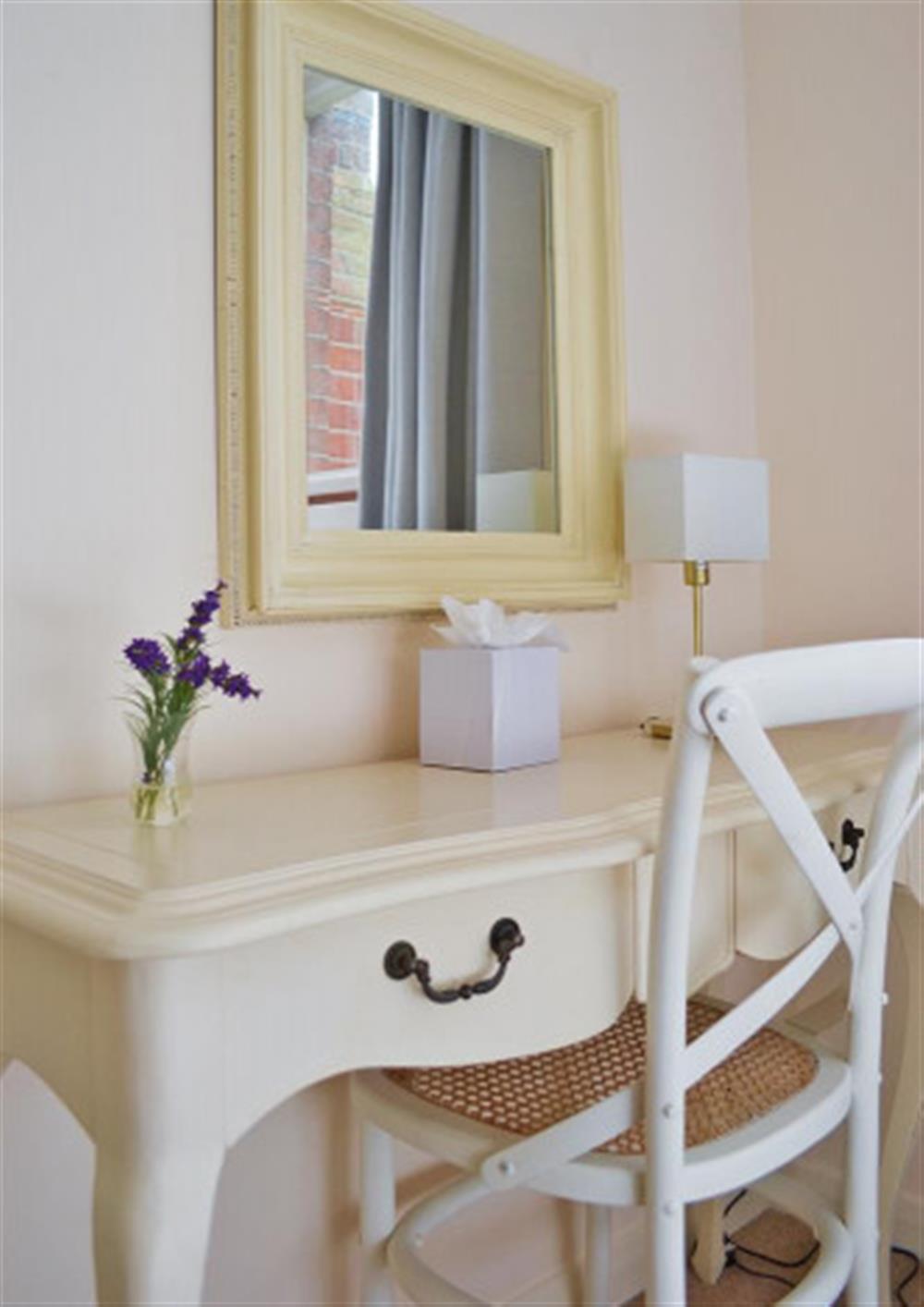 First floor double bedroom's dressing area at Pittefaux Cottage in Brockenhurst