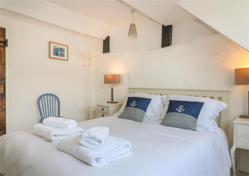This is a bedroom at Pixie Cottage, Looe