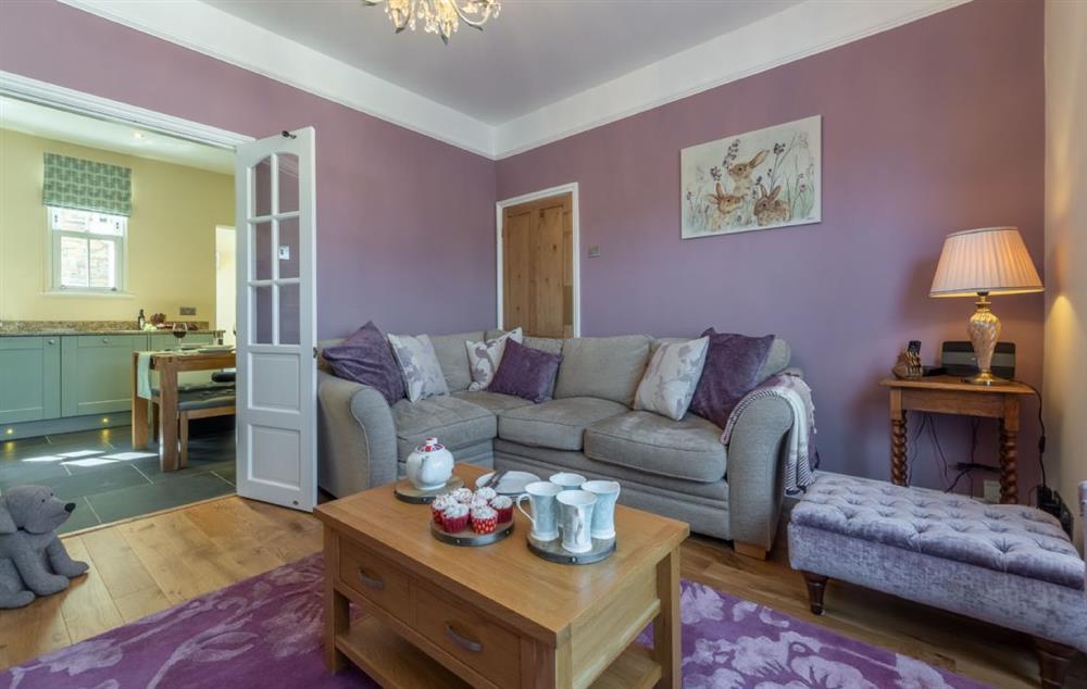 Spacious and elegant sitting room with comfortable sofas at Place View, Fowey