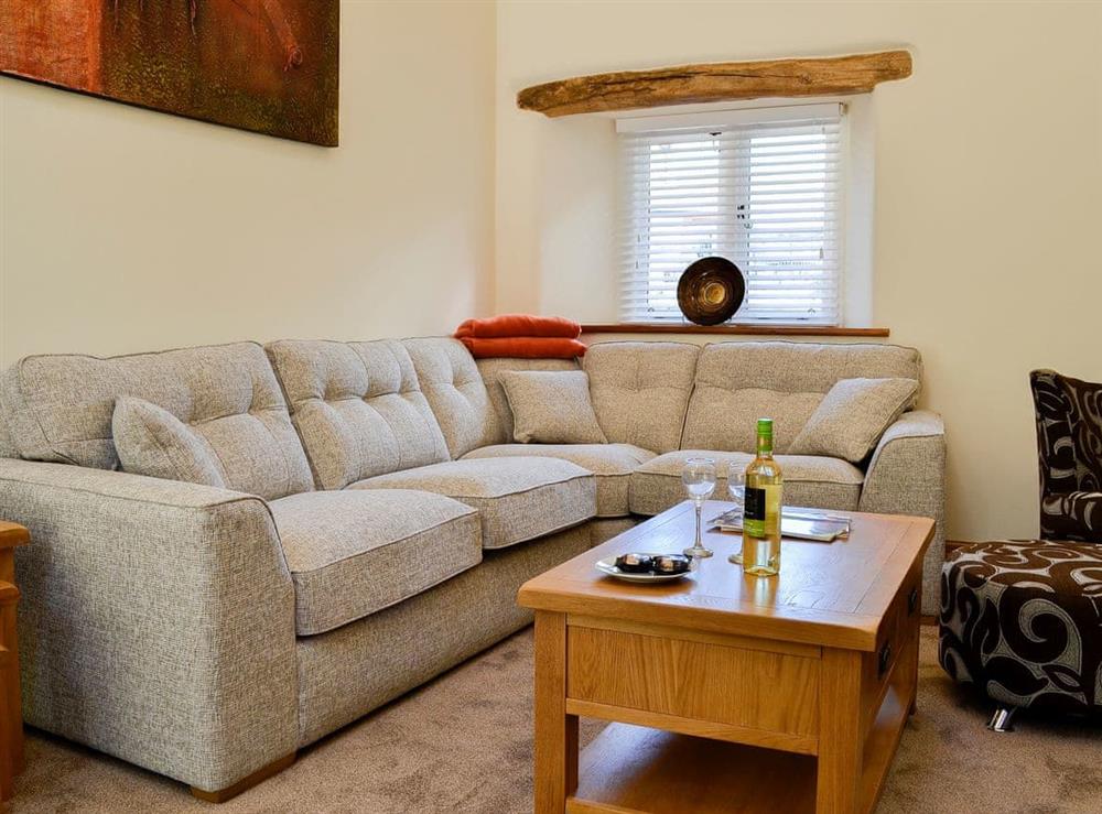 Comfortable living space at Cruck Barn, 