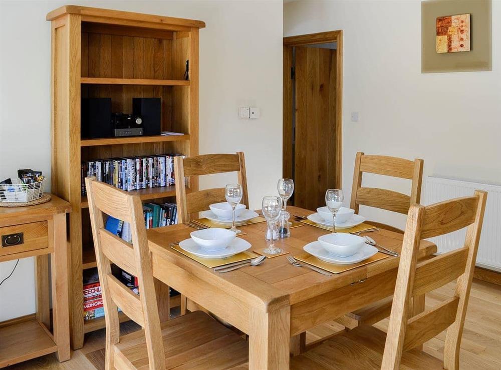 Lovely contemporary dining area at Cruck Barn, 