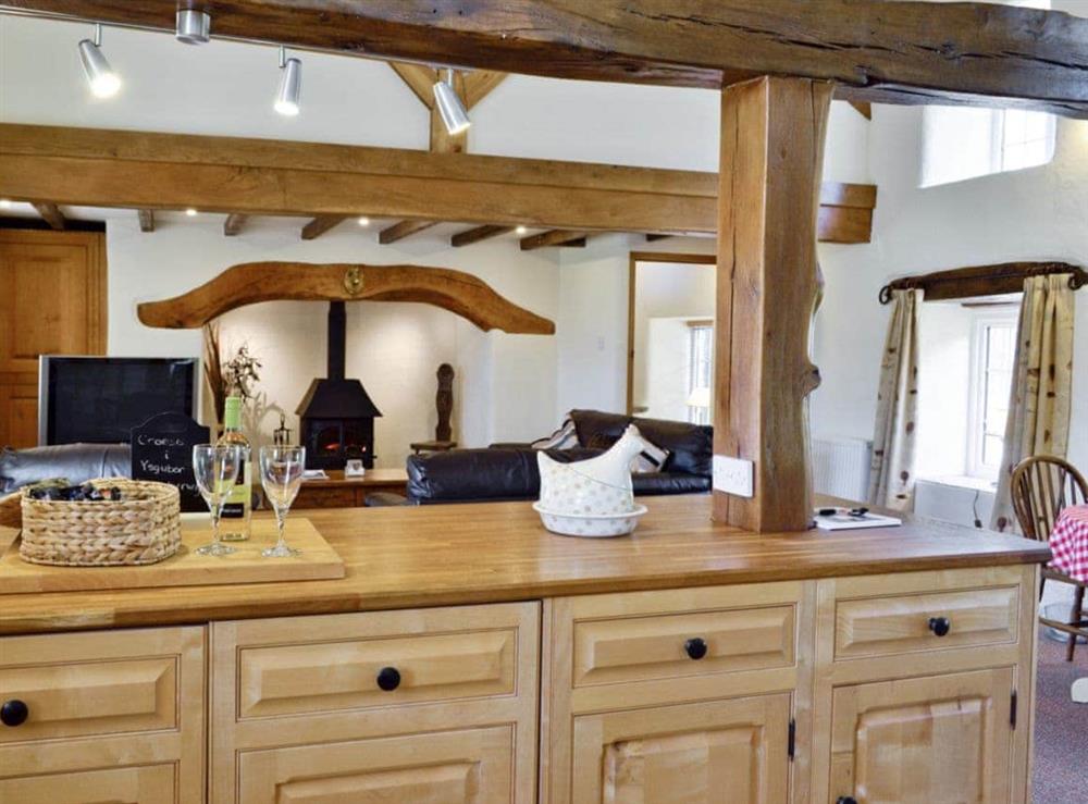 Open plan living/dining room/kitchen (photo 2) at Plas Iwrwg Granary in Maenan, near Llanrwst, Gwynedd