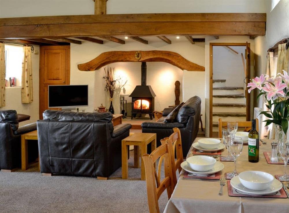 Open plan style living space at Plas Iwrwg Granary in Maenan, near Llanrwst, Gwynedd