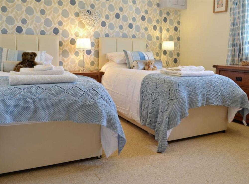 Twin bedroom at Plas Iwrwg Granary in Maenan, near Llanrwst, Gwynedd