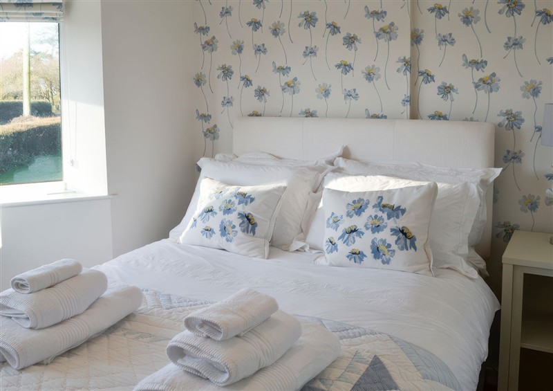 A bedroom in Plas Lodge at Plas Lodge, Llanfaelog