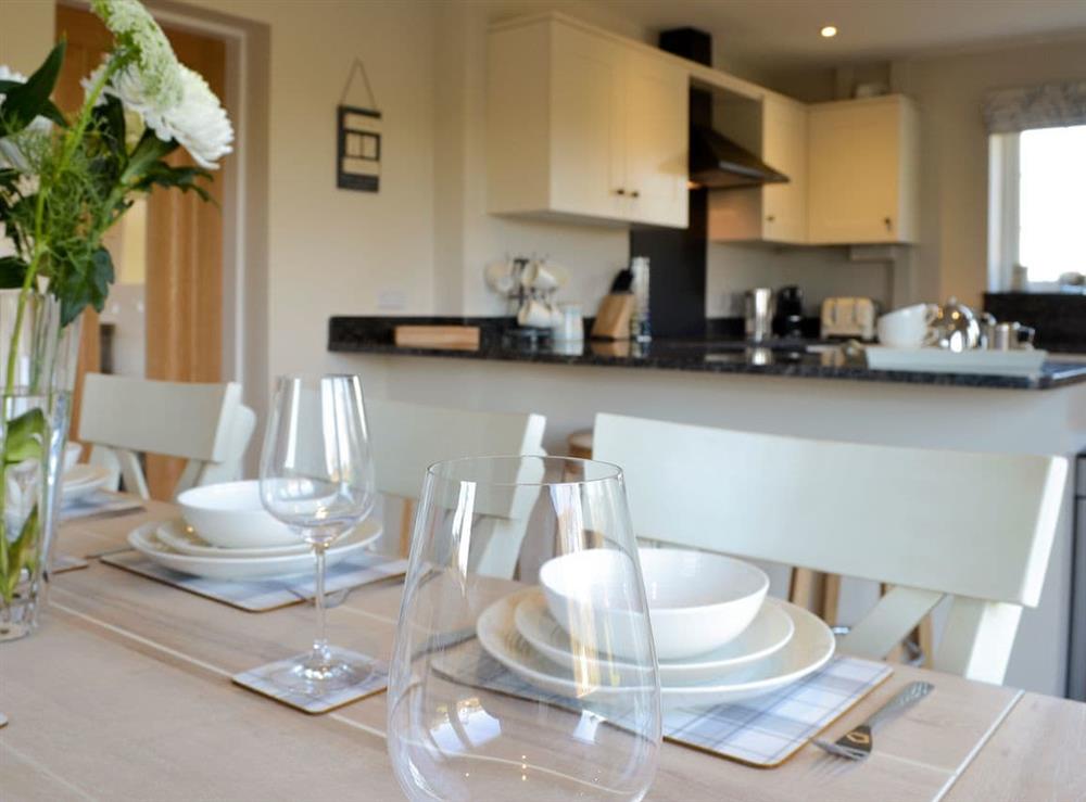 Dining area of stylish kitchen and dining room at Plas Lodge in Rhosneigr, near Holyhead, Gwynedd