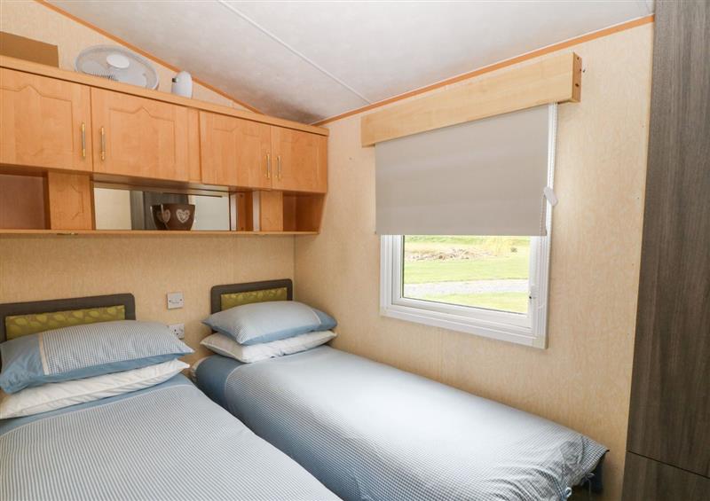 One of the bedrooms at Plastirion Caravan, Llanfairynghornwy